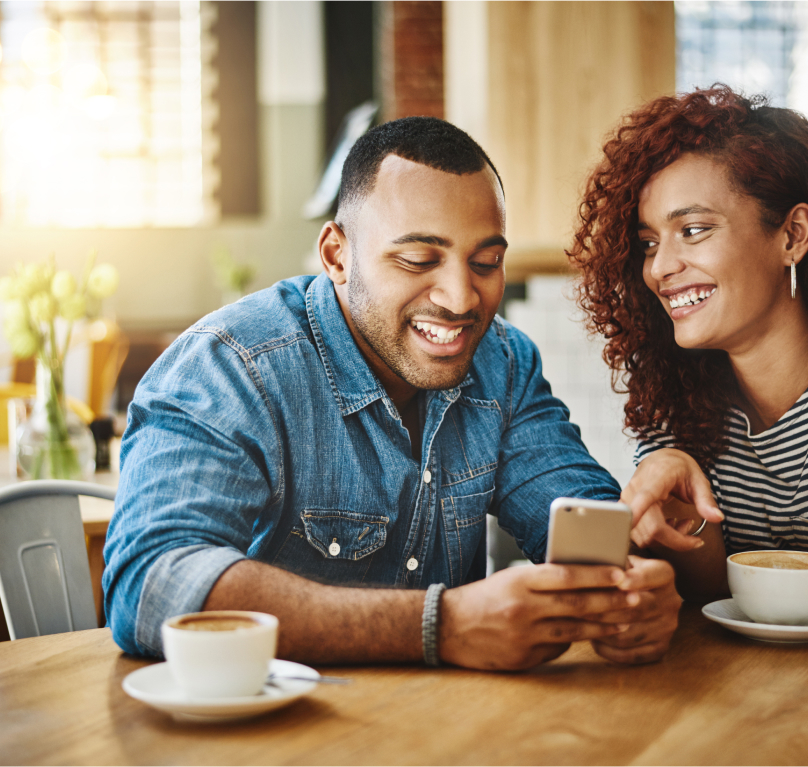 Couple holding phone